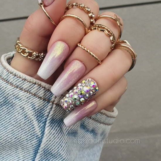 Shiny nude baby boomer ombre press-on nails with silver chrome accents, showcasing international shipping options