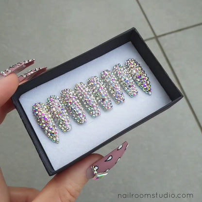 Full-coverage press-on nails adorned with shimmering silver rhinestones for a sparkling effect by Nail Room Studio