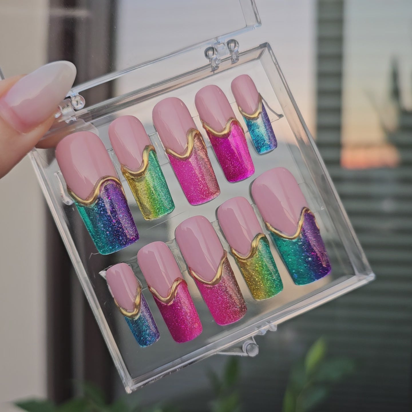 Rainbow french tips press on nails made to order, packed in a clear box with international shipping, unique ombre colorful design with hand made gold chrome 3D sculpted accents