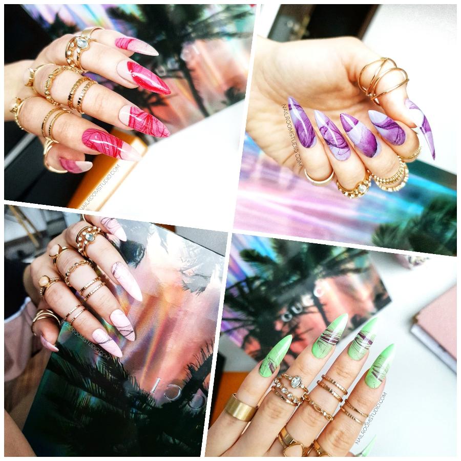 Elegant waterpainting nails with a smoke and marble effect, blending red, purple, nude, and green in a chic style