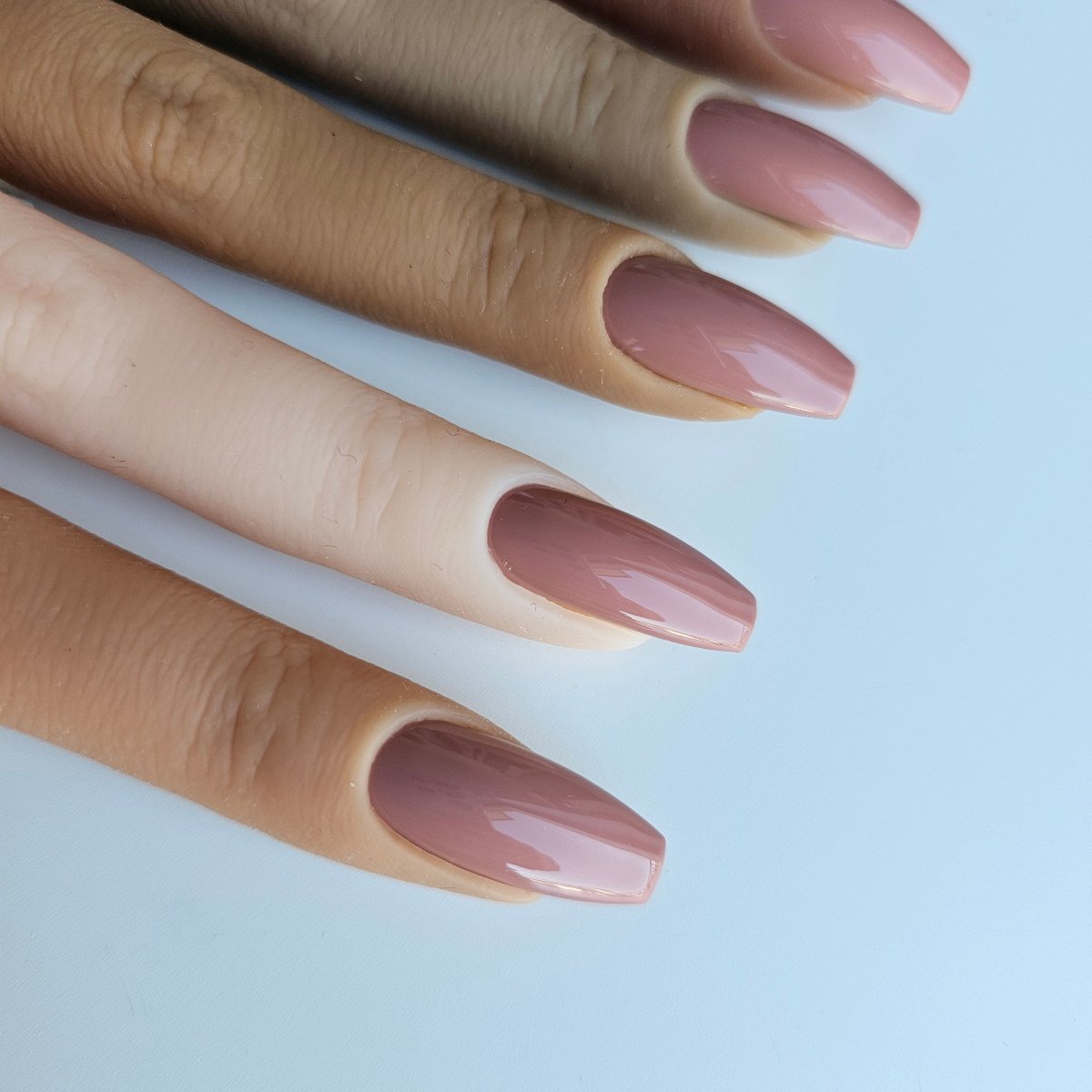 Warm cappuccino artificial nails, a rich light brown hue that blends effortlessly with every skin tone, custom manicure and matching pedicure from Press On Nails online shop