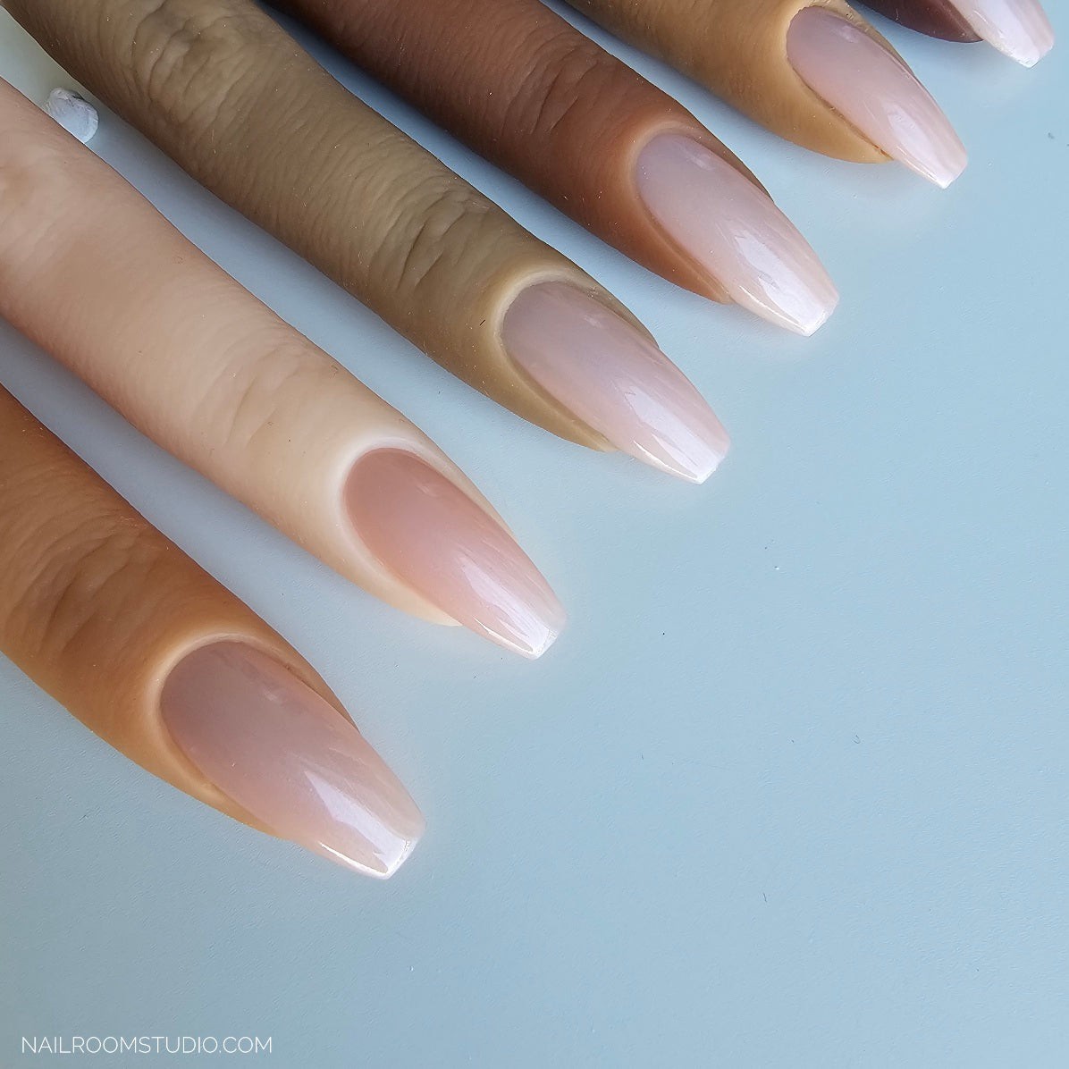 Delicate natural pink with a pearl sheen in PressOn nails, ideal for lighter skin and subtle style