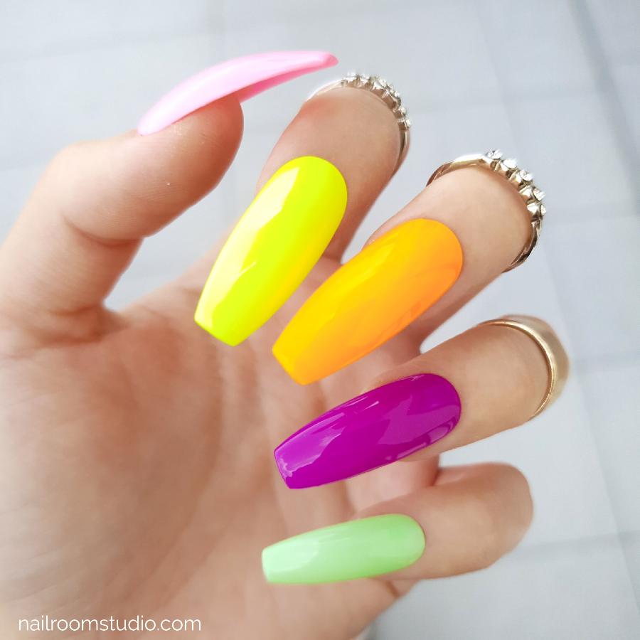 Long coffin press-on nails in vibrant neon shades, perfect for summer fun. Available in glossy or matte finishes with online shopping and international shipping