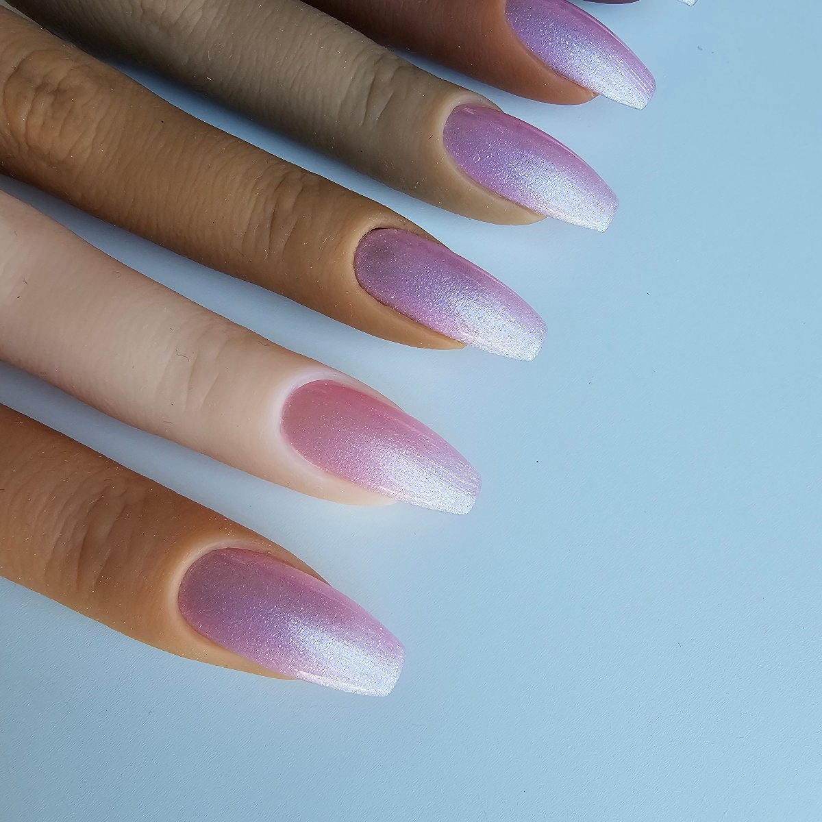 Party-ready vibrant pink artificial nails with a striking hue, ideal for making a bold statement, you can match toes and manicure nails for hands and see swatches with many skin shades