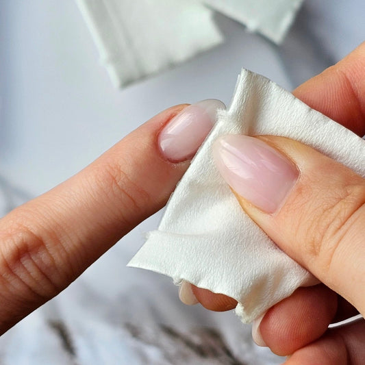 High-quality white multilayer lint-free wipes for nail application and cleaning, ideal for use with Press-On Nails and other beauty applications